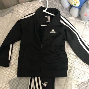3T Adias track suit.